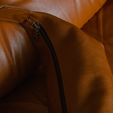 Tan leather Sling Bag crafted by Paula Kirkwood.